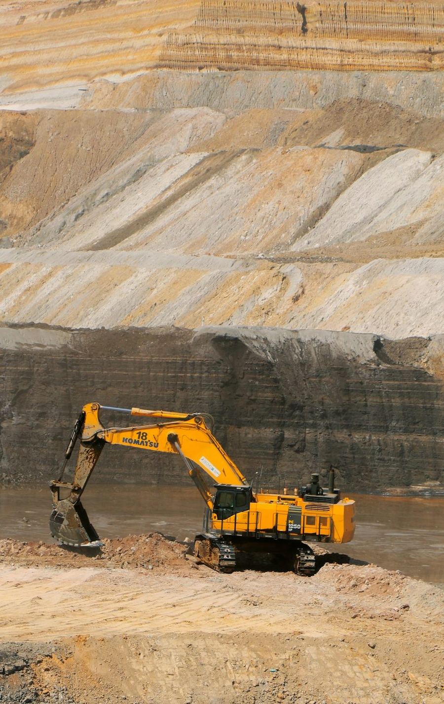 Excavator working in an open-pit mine